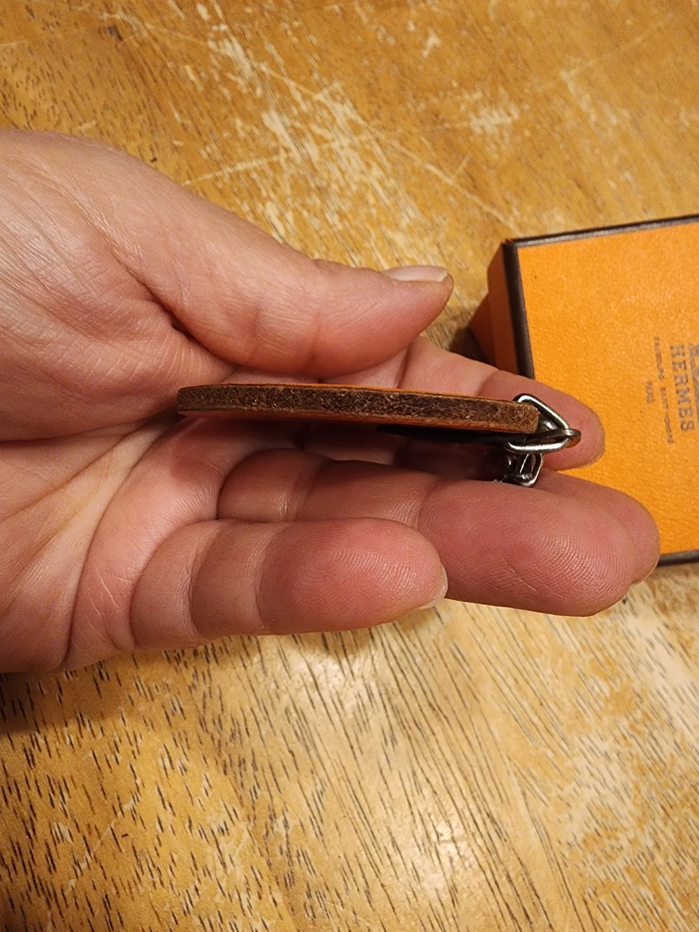 authentic Hermès orange fruit leather bag charm and keychain
